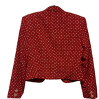 Back view of a vintage 1990s Recycle Me Fancy ESPRIT cropped blazer in red with a white polka dot pattern.