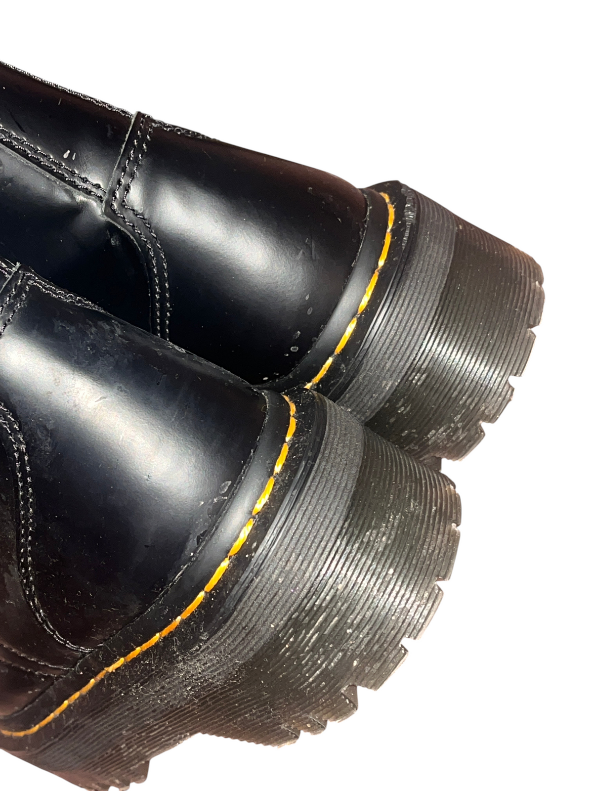 Recycle Me Fancy Dr. Martens Jadon black leather platform boots showing the chunky sole and signature yellow stitching