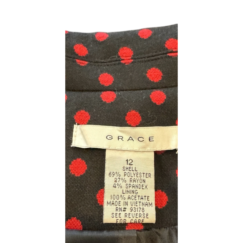 Recycle Me Fancy GRACE blazer interior label showing size 12, fabric composition, and red polka dot black fabric
