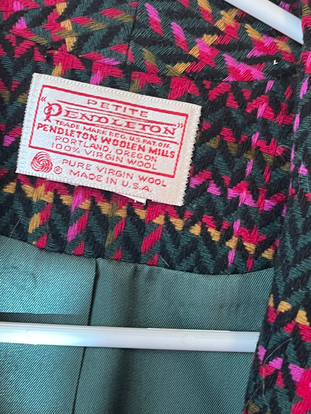 Recycle Me Fancy vintage Pendleton petite blazer label showing 100% virgin wool plaid fabric and satin lining