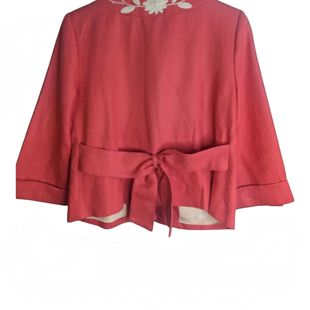 Recycle Me Fancy vintage NYGÅRD coral pink blazer with ivory floral embroidery and a back tie-waist detail.