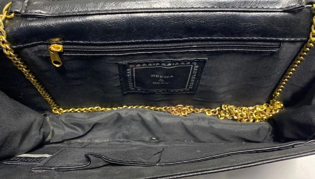Deena & Ozzy clutch interior with chain strap and pockets