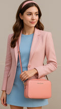 Bubble gum pink Michael Kors crossbody handbag