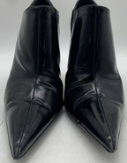 Prada black pointed-toe ankle booties front view