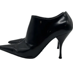 Prada black pointed-toe ankle booties profile view