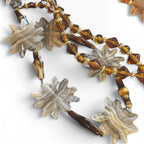 Recycle Me Fancy vintage necklace featuring gray banded agate star charms, tiger's-eye nuggets, and amber glass beads.
