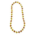 Recycle Me Fancy vintage necklace featuring faceted amber and cognac glass beads in a bold statement design.
