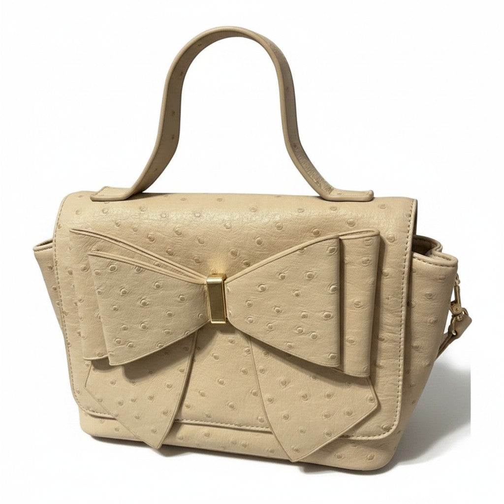 Recycle Me Fancy vintage cream ostrich-embossed leather handbag with an oversized bow and gold-tone hardware.