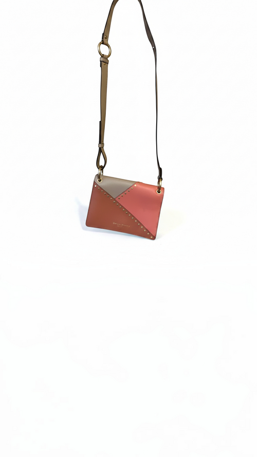Recycle Me Fancy Donna Karan color-blocked coral and taupe leather envelope crossbody bag with gold-tone studs.