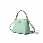 Recycle Me Fancy mint green pebbled leather Kate Spade crossbody bag with gold hardware and top handle
