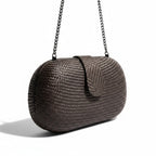 Recycle Me Fancy vintage metallic pewter woven oval clutch with a slim chain strap and fold-over flap closure